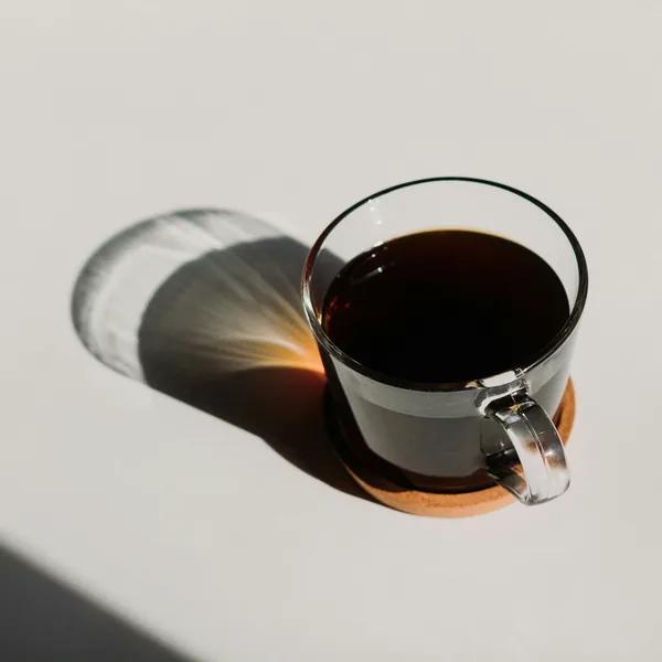 Dark roasted coffee beans with an oily sheen